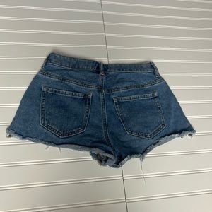 selling blue jean shorts. Brand: Pacsun Size: 25
